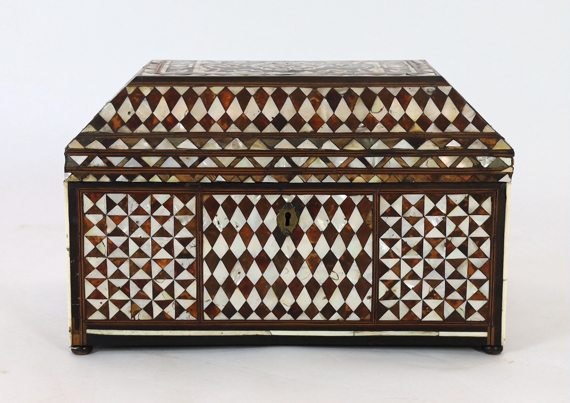 A late 18th/early 19th century Ottoman tortoiseshell and mother-of-pearl scribe’s casket, 49cm wide 30cm deep 31cm high